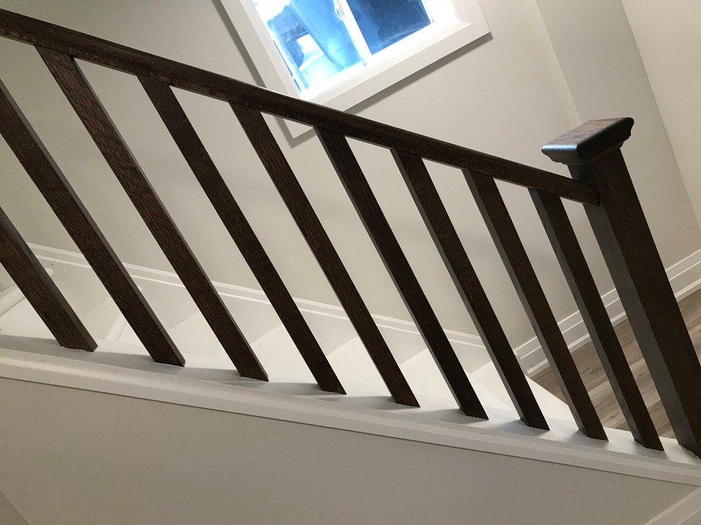 Example of a transitional home design design in Toronto