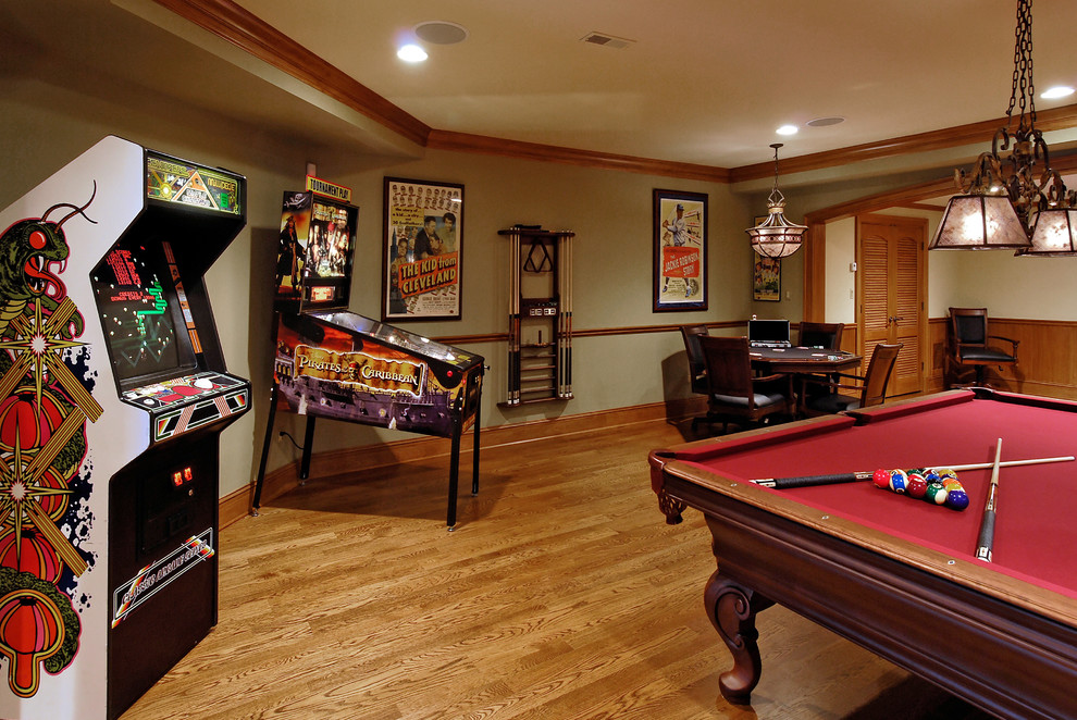Design ideas for a traditional basement in DC Metro with medium hardwood floors.