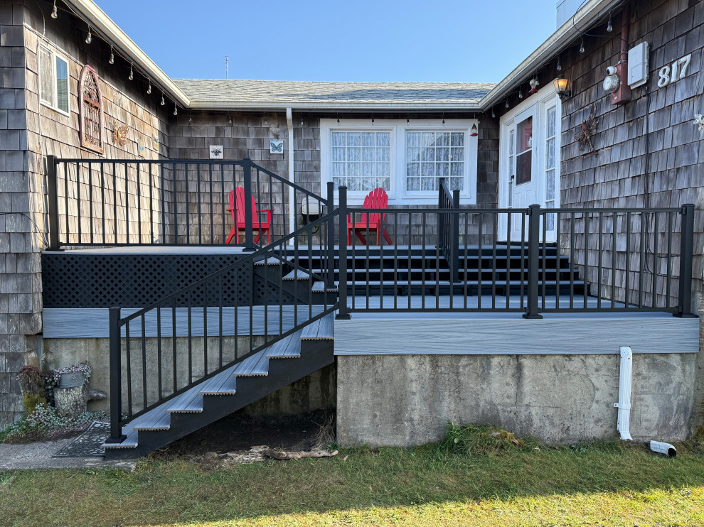 Example of a beach style deck design in Seattle
