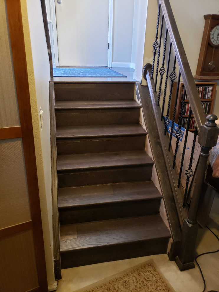 Classic Iron Balusters & Dark Wood Staircase Transformation