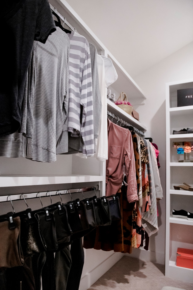 Inspiration for a transitional closet remodel in Other
