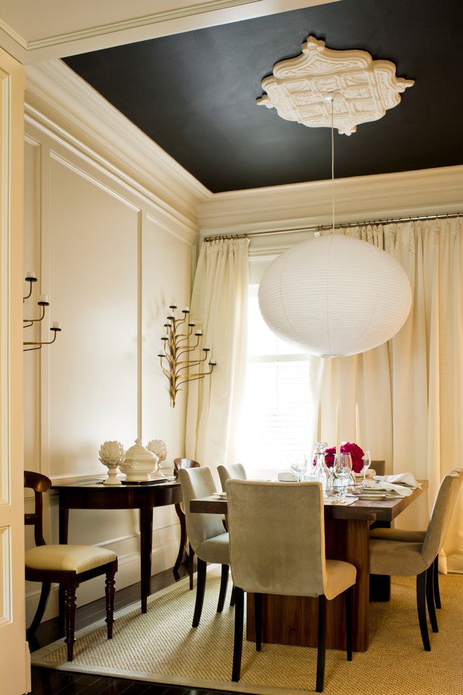 Design ideas for a transitional dining room in Toronto with white walls and dark hardwood floors.