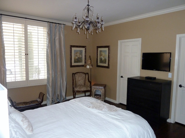 Guest Suite With Tv Mounted On Wall Over Small Dresser