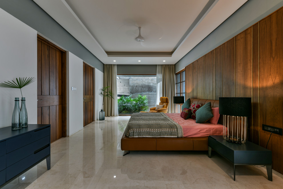 ムンバイにあるトロピカルスタイルのおしゃれな寝室