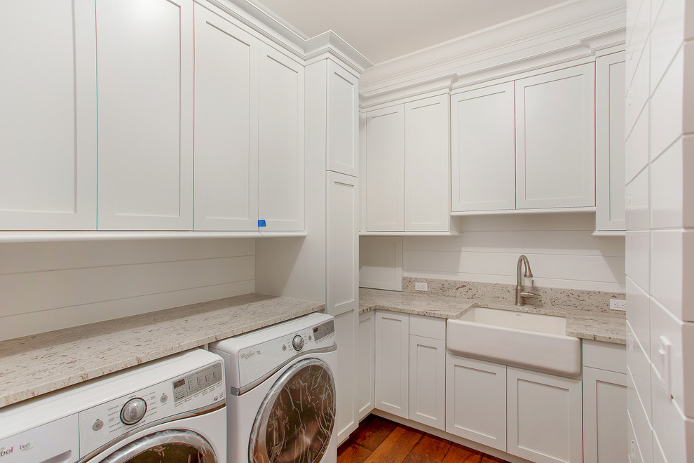 Design ideas for a tropical laundry room in Tampa.