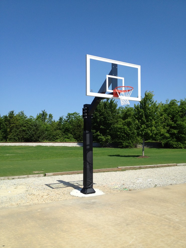 Inspiration for a large traditional backyard partial sun outdoor sport court in Little Rock.