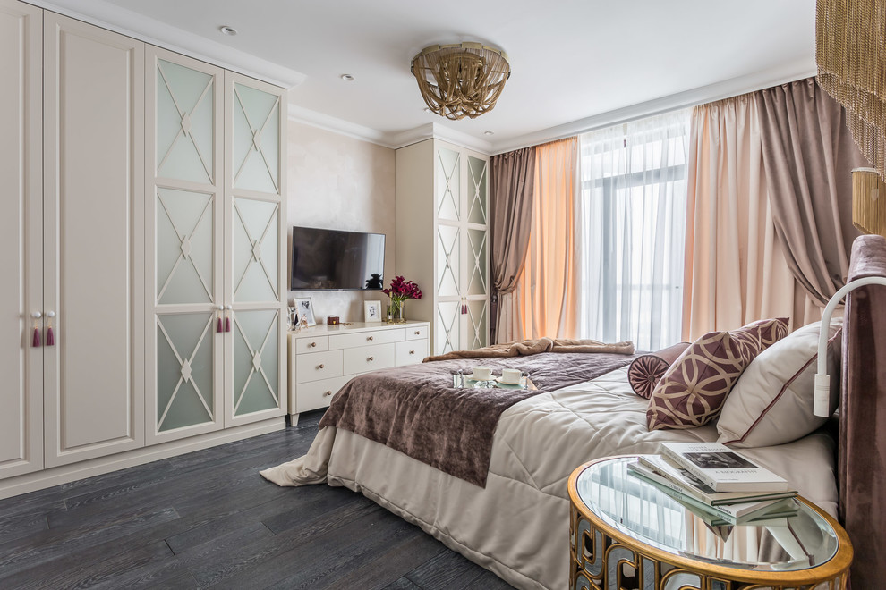 Photo of a transitional master bedroom in Saint Petersburg with beige walls, dark hardwood floors and black floor.