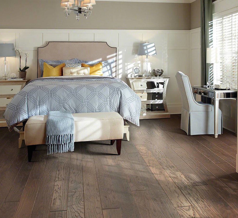 Photo of a mid-sized transitional master bedroom in Denver with beige walls, dark hardwood floors and brown floor.