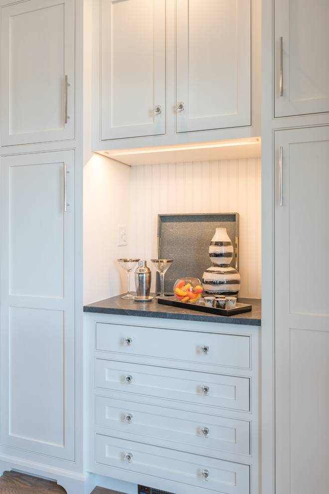 Example of a transitional home design design in Boston