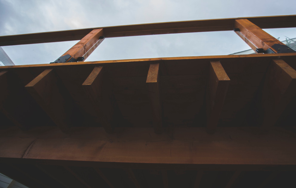 Deck - rustic deck idea in Calgary