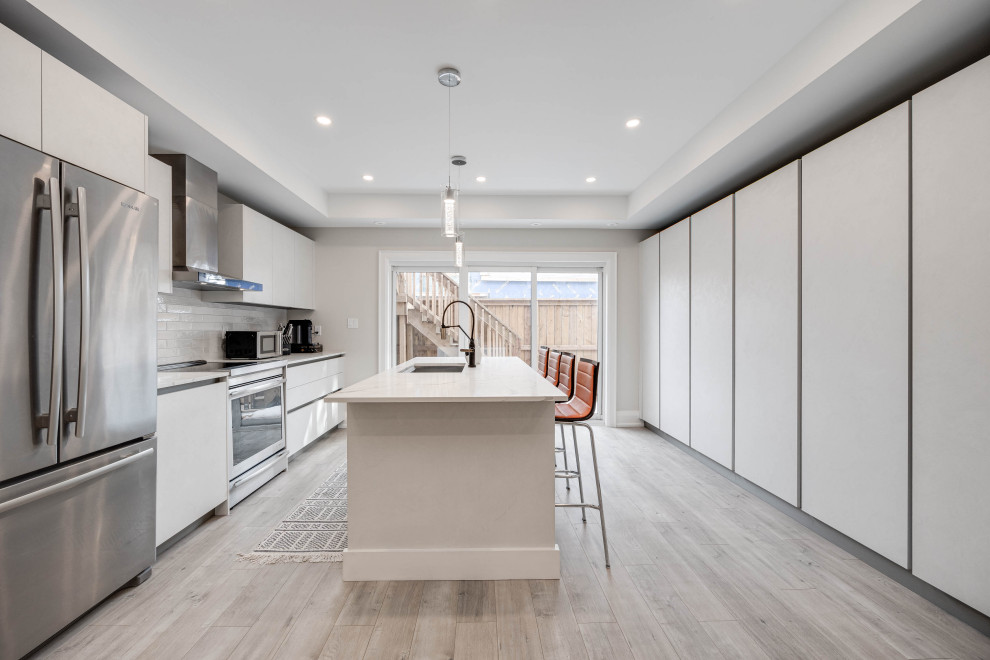 Eclectic kitchen photo in Toronto