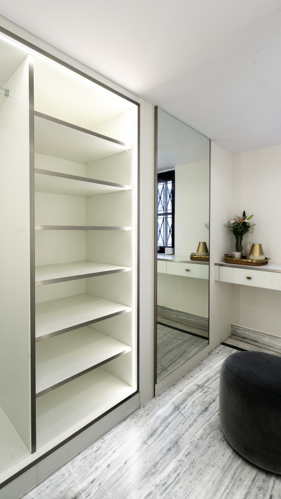 This is an example of a contemporary storage and wardrobe in Bengaluru.