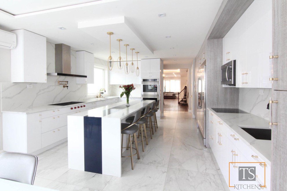 This is an example of a large contemporary eat-in kitchen in New York with an undermount sink, flat-panel cabinets, white cabinets, quartzite benchtops, multi-coloured splashback, stone slab splashback, stainless steel appliances, ceramic floors, with island, yellow floor and white benchtop.