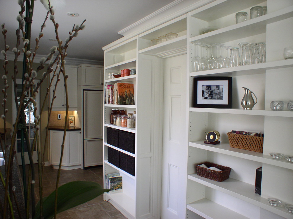 Example of a transitional kitchen design in Toronto