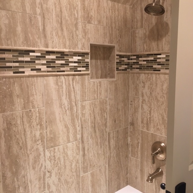 Alcove shower - mid-sized transitional master beige tile and porcelain tile alcove shower idea with beige walls