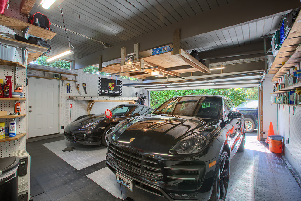 Inspiration for a mid-sized transitional attached two-car workshop in Seattle.