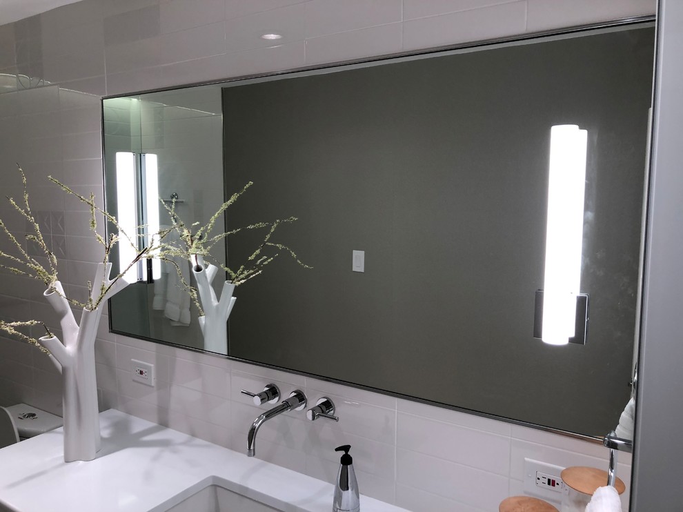 Design ideas for a small modern master bathroom in Dallas with glass-front cabinets, grey cabinets, an open shower, a one-piece toilet, white tile, ceramic tile, grey walls, porcelain floors, an undermount sink, engineered quartz benchtops, white floor, an open shower and white benchtops.