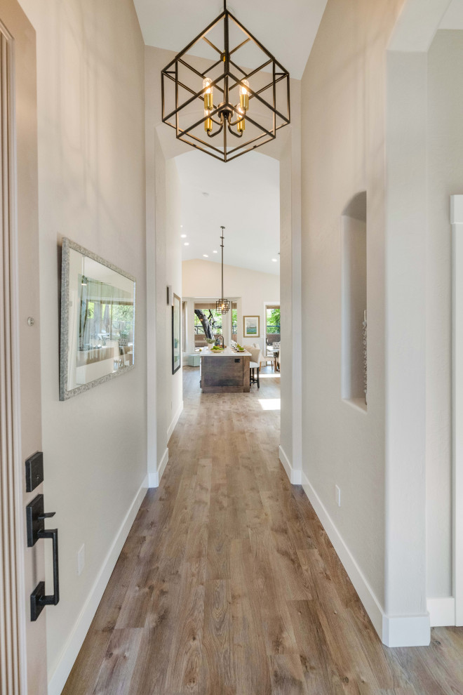 Example of a transitional home design design in Phoenix