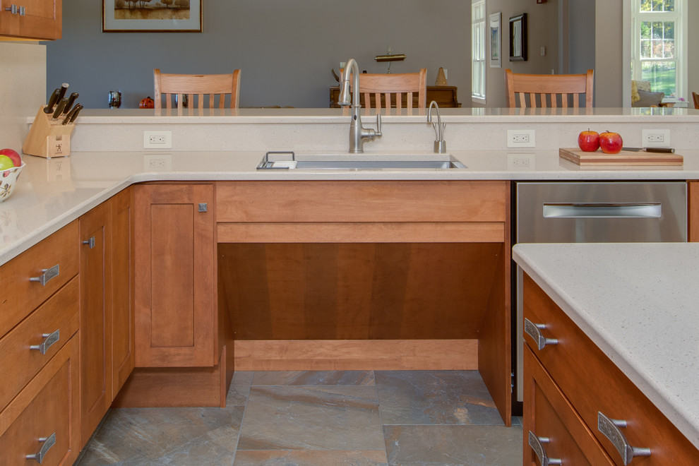 Example of a huge transitional u-shaped open concept kitchen design in Boston with an undermount sink, shaker cabinets, medium tone wood cabinets, quartz countertops, stone slab backsplash, stainless steel appliances and an island