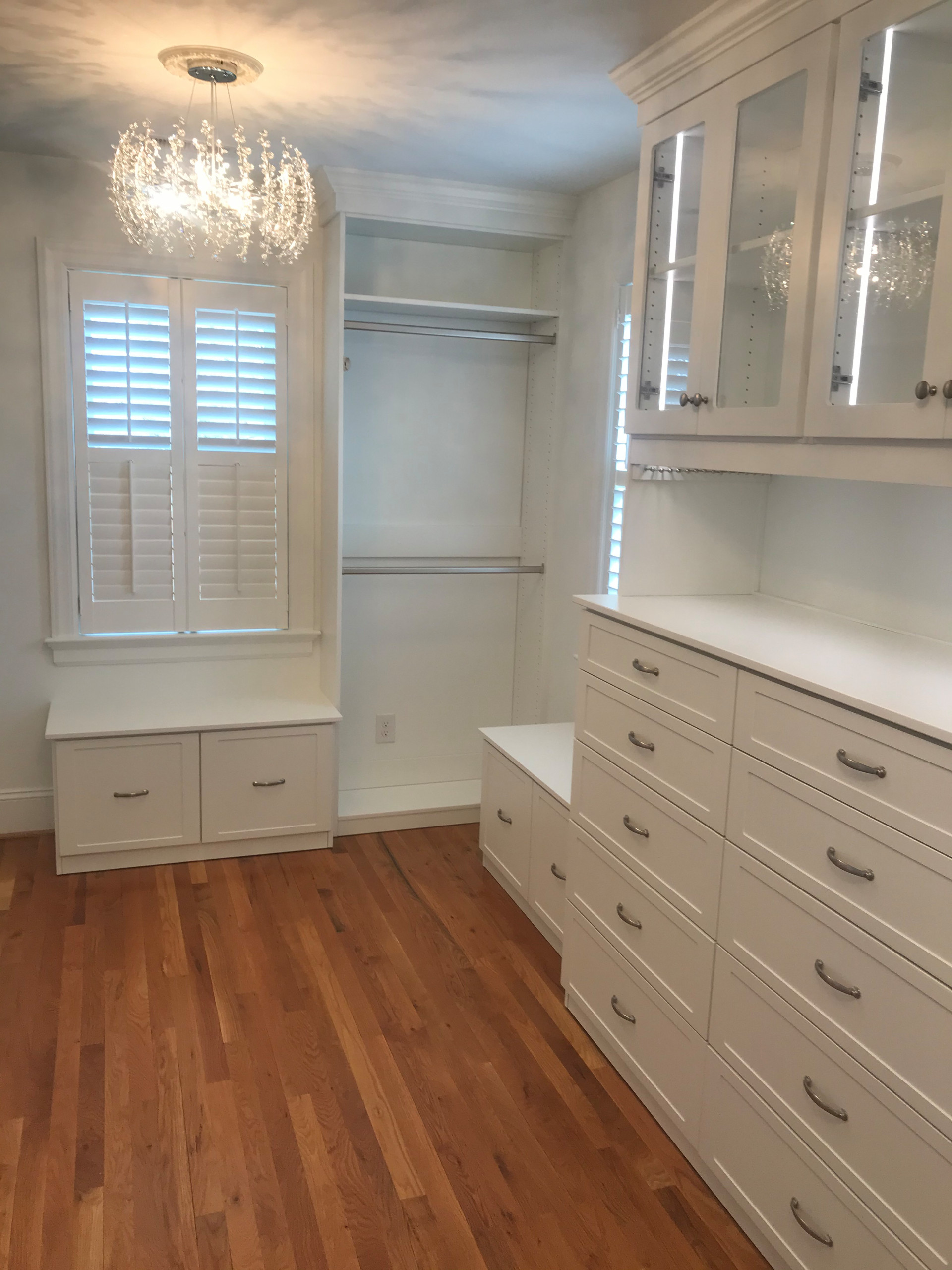Lighted White Dressing Room with Chandeliers