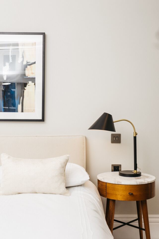 Photo of a traditional bedroom in London.