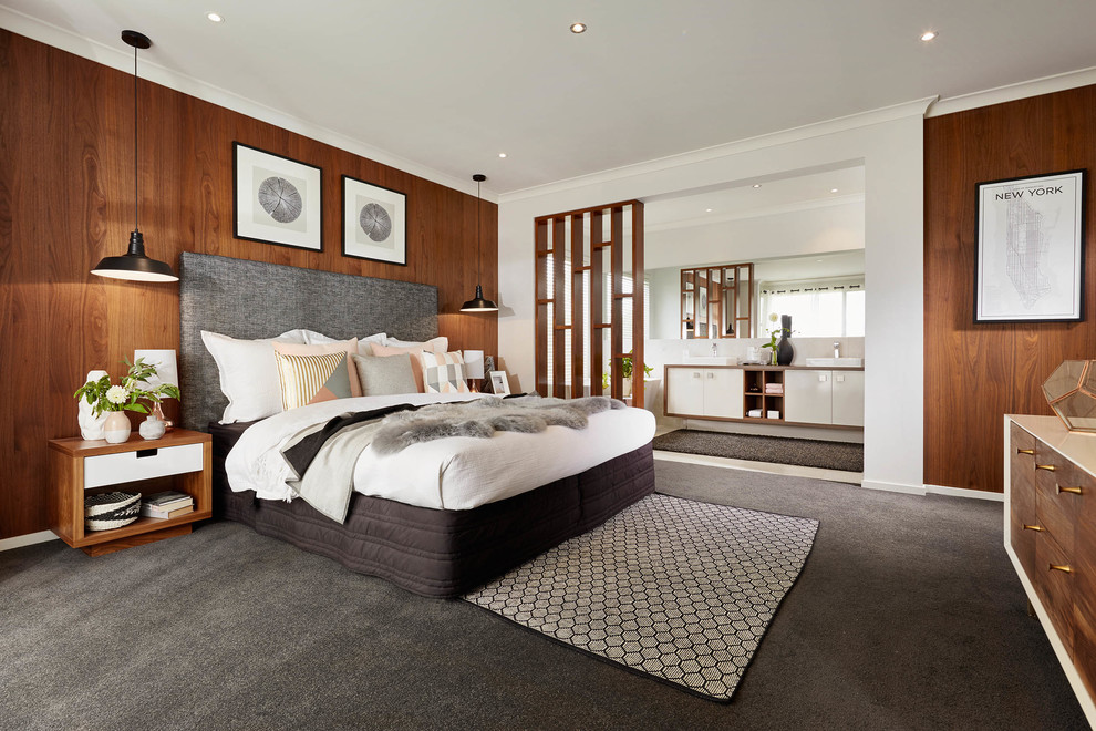 Design ideas for a contemporary master bedroom in Melbourne with carpet.