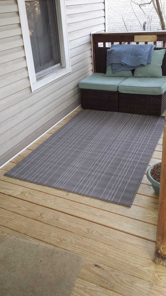 Inspiration for a rustic backyard balcony deck remodel