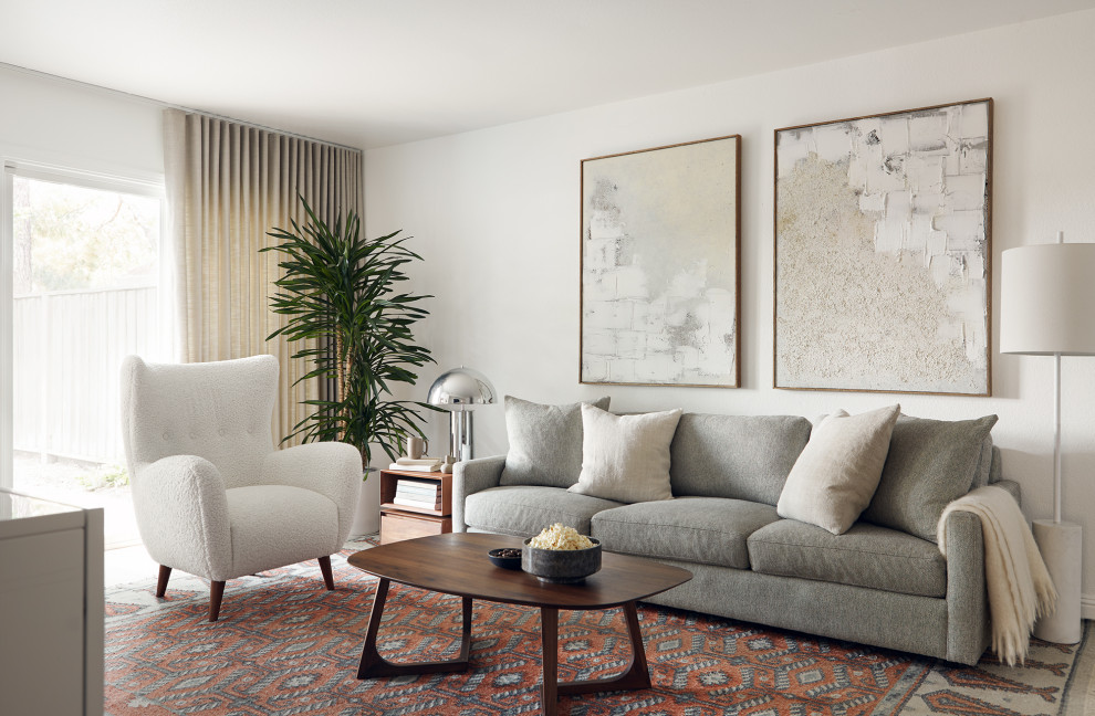 Ispirazione per un soggiorno moderno di medie dimensioni con pareti bianche e pavimento in legno massello medio
