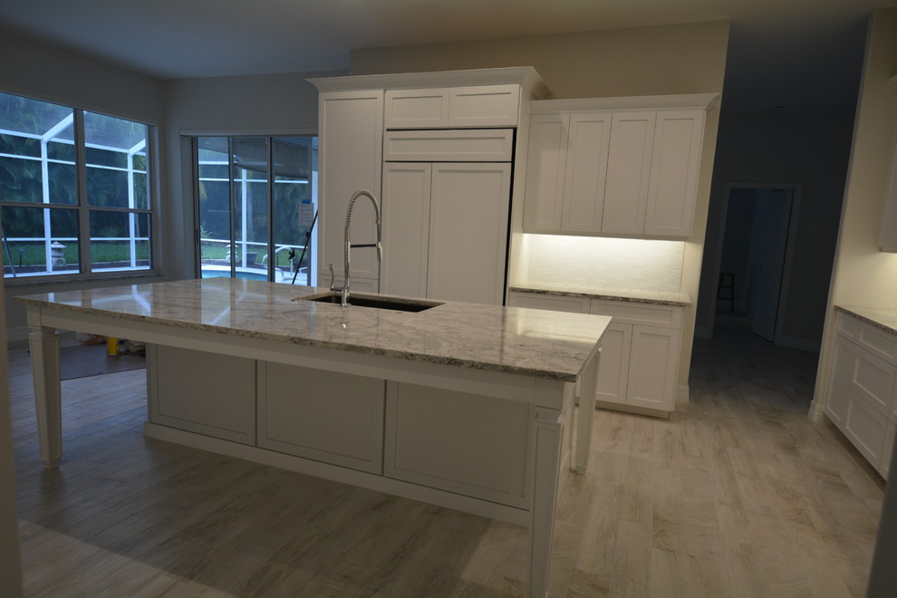 Example of a transitional kitchen design in Miami