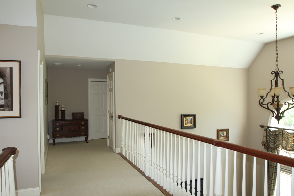 Design ideas for a large transitional hallway in Providence with carpet and grey walls.