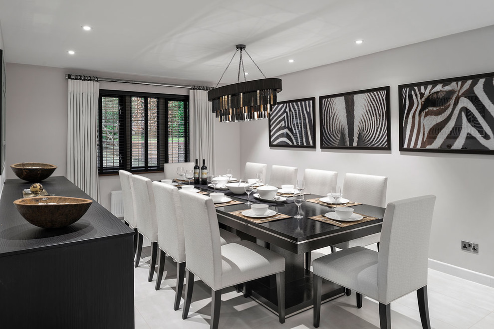 Transitional dining room in Berkshire with white walls and no fireplace.