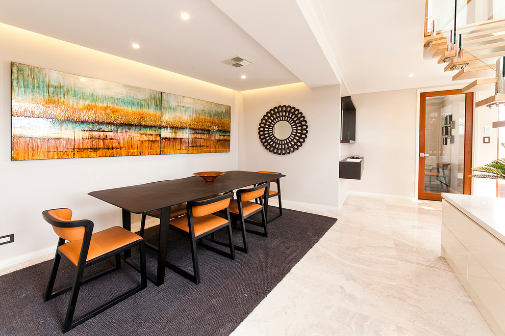 Photo of a contemporary dining room in Perth with white walls and beige floor.