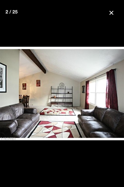  Split  level  living room furniture arrangement 