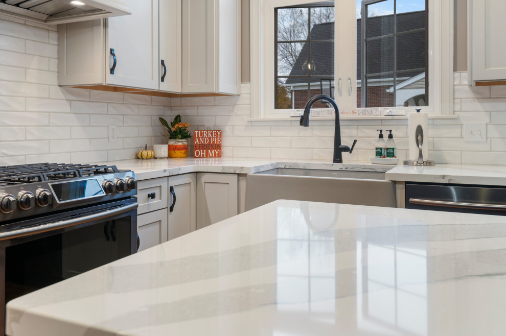 Example of a large transitional kitchen design in Cleveland