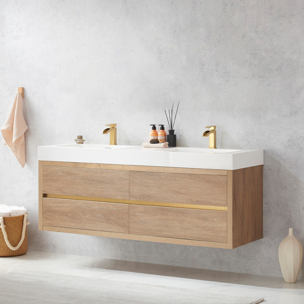 Immagine di una stanza da bagno padronale minimalista con ante lisce, ante in legno chiaro, lavabo integrato, top bianco, due lavabi e mobile bagno sospeso