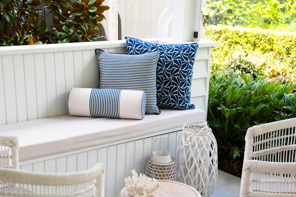 This is an example of a beach style patio in Brisbane.