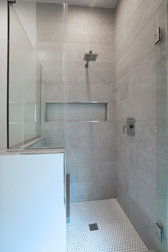 Inspiration for a large contemporary bathroom in Phoenix with a corner shower, a hinged shower door, gray tile and cement tile.