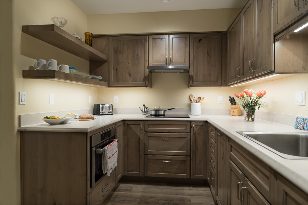 Kitchen - transitional kitchen idea in Seattle with yellow walls