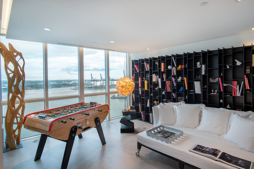 Inspiration for a contemporary family room in Miami with a game room and white walls.