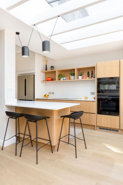 Modern Elegance Meets Oak Warmth Handleless Flat Slab Shaker Kitchen contemporary-kitchen