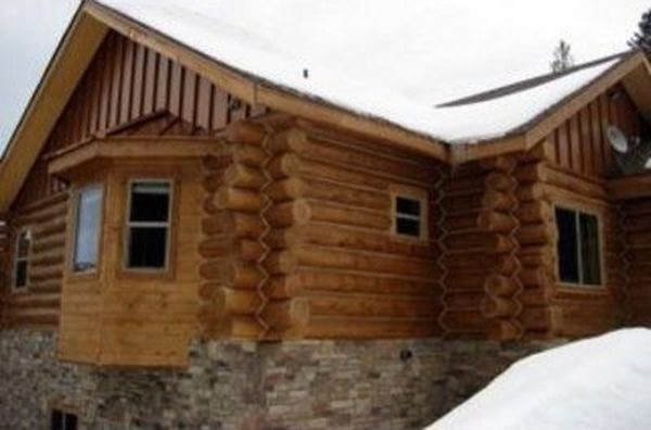 Inspiration for a mid-sized rustic red two-story wood exterior home remodel