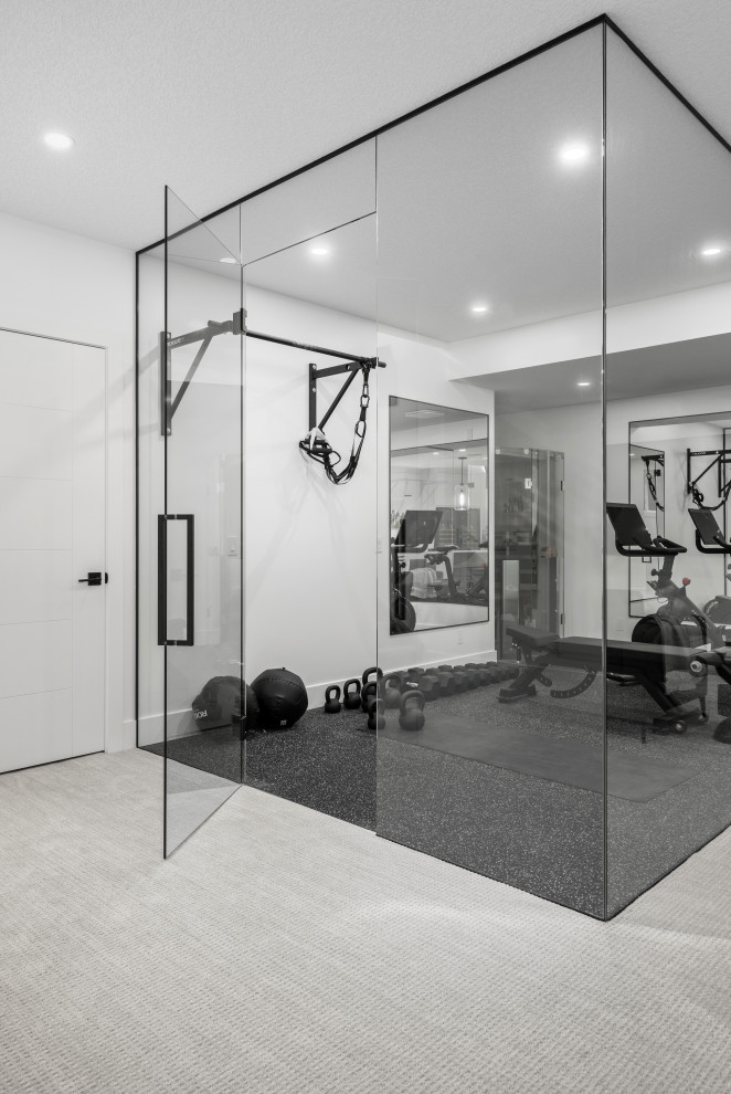 Multifunktionaler, Mittelgroßer Moderner Fitnessraum mit weißer Wandfarbe und schwarzem Boden in Calgary