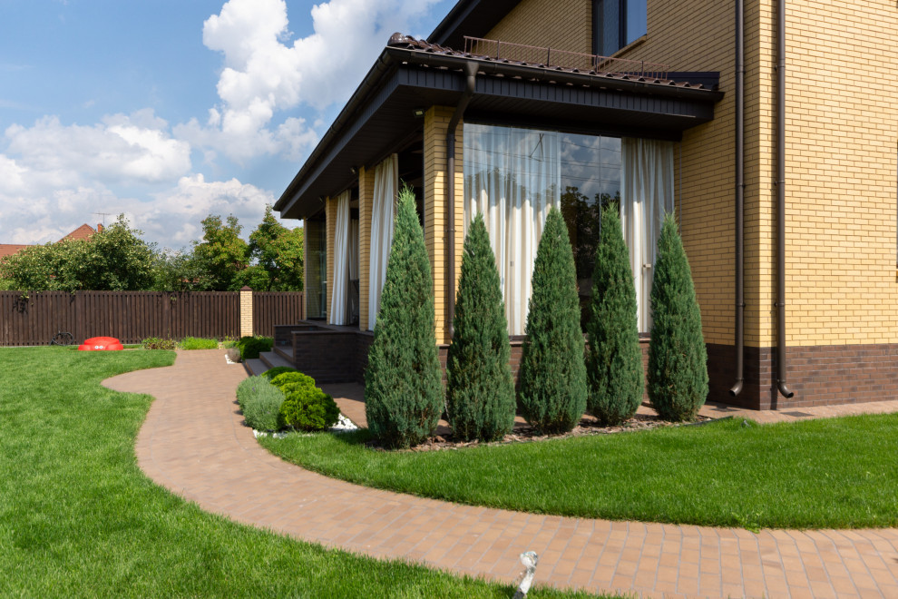 Классическая терраса с безрамным остеклением