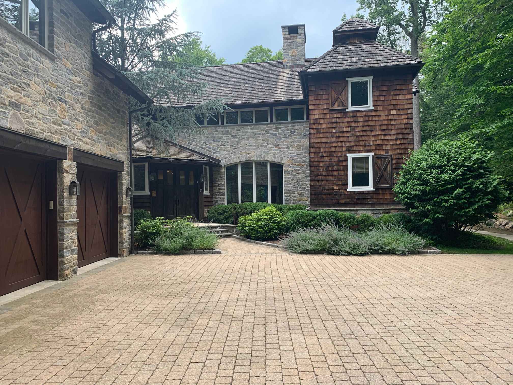 Home in North Stamford.   Unilock Pavers Driveway. Front foundation to be enhanced. Early Stage of the job. Fall 2020. Peter Atkins and Associates.,LLC