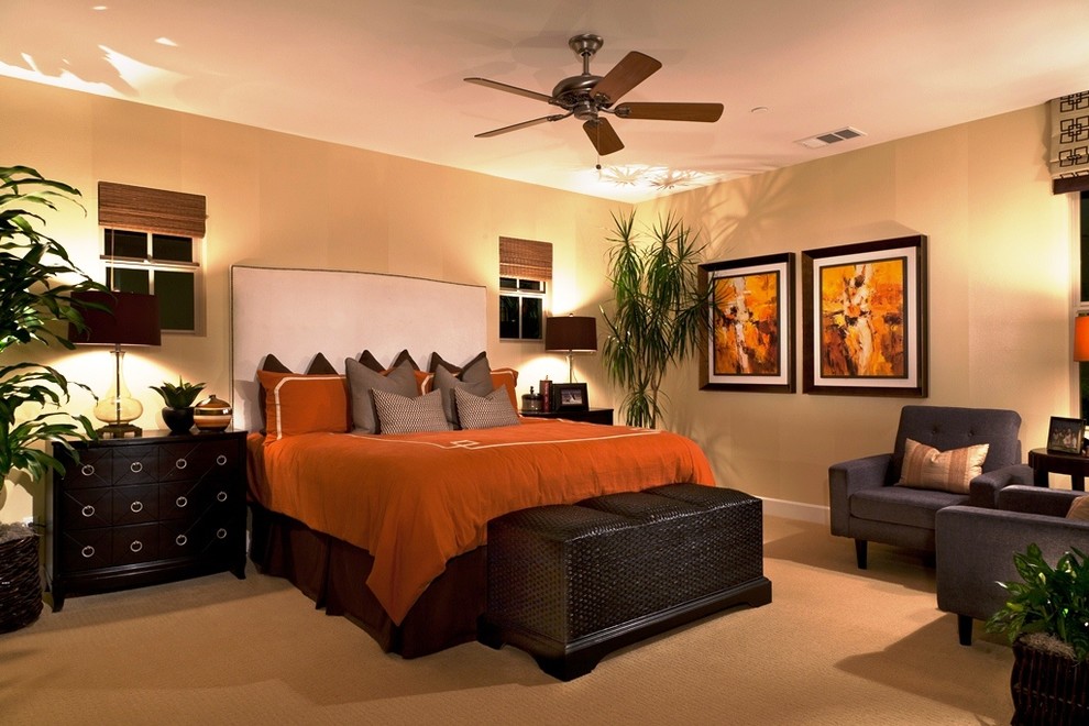 Inspiration for a large contemporary master bedroom in San Diego with beige walls, carpet, no fireplace and orange floor.