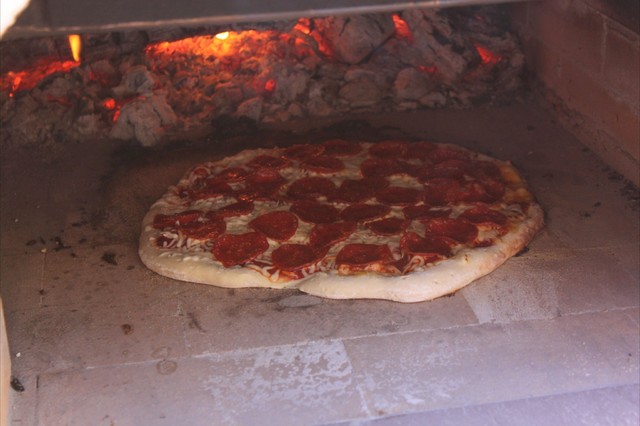 Pizza Oven Made of Brick, Cement and Tile Being Prepped for Baki