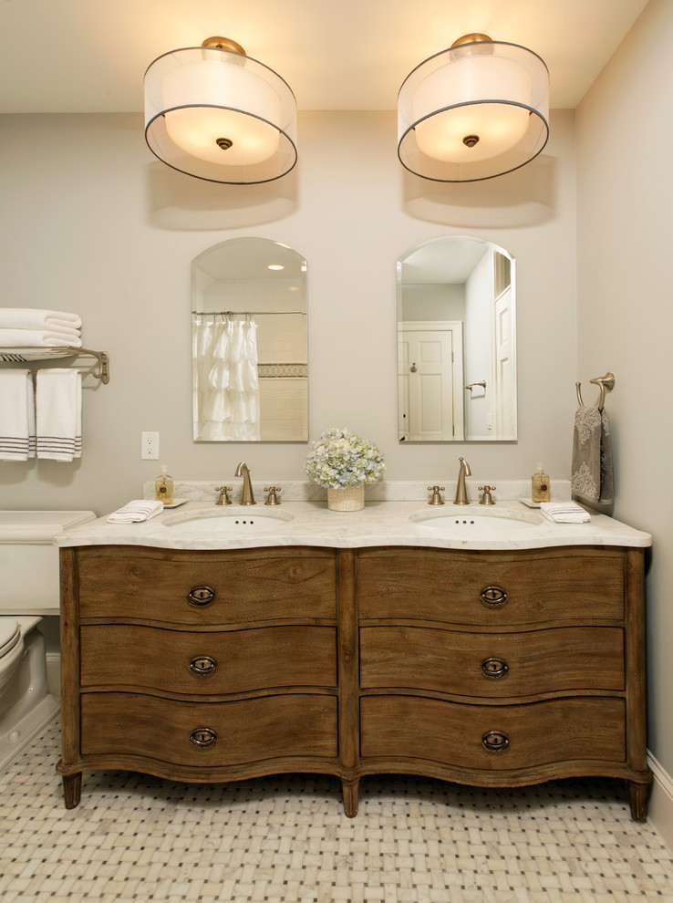 This is an example of a traditional bathroom in DC Metro with flat-panel cabinets.