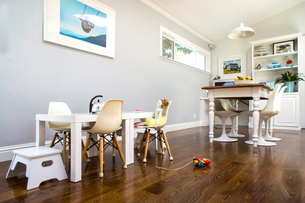 Inspiration for a transitional gender-neutral kids' playroom in San Francisco with grey walls and dark hardwood floors.
