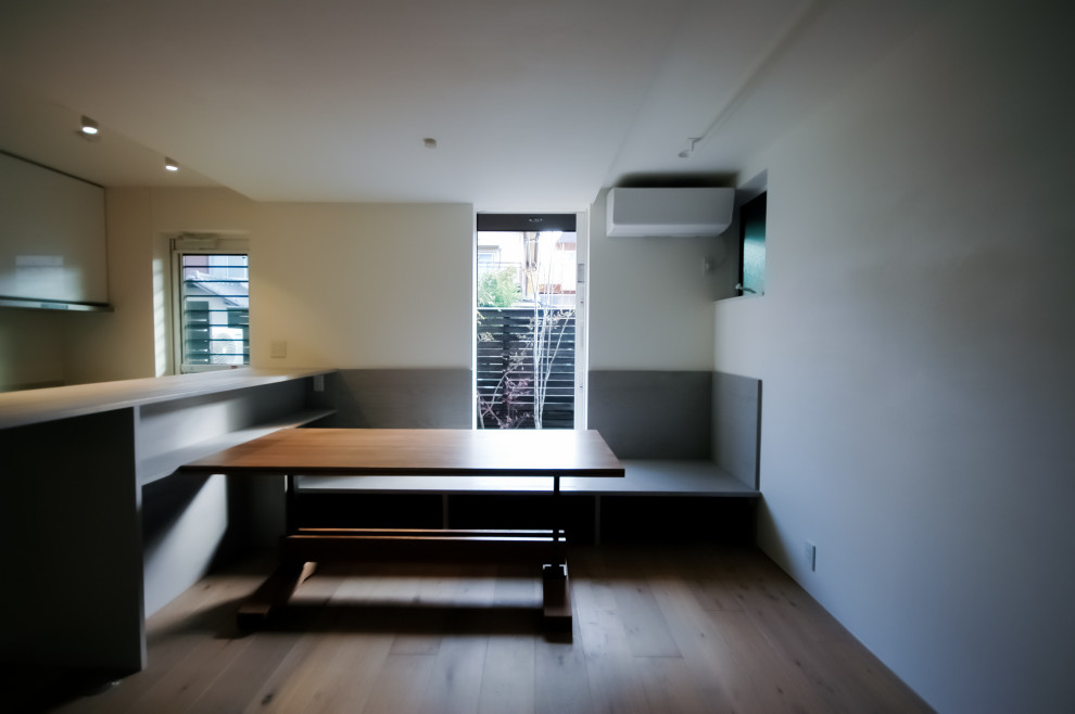 Photo of a small asian kitchen/dining combo in Kyoto with medium hardwood floors.