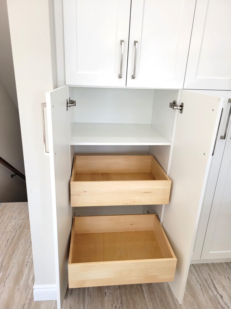 Inspiration for a huge transitional u-shaped vinyl floor and multicolored floor eat-in kitchen remodel with an undermount sink, white cabinets, quartzite countertops, gray backsplash, stone tile backsplash, stainless steel appliances, an island and white countertops